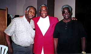 Bobby Mansfield greets Louis Woolridge and Eddie Davis